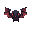 a black bat with red eyes