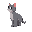 gray cat looking to the left while standing 