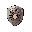 create a metal shield with the head of a medusa at its center.