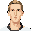 front view face reference image only, based on the uploaded face photo. keep the same facial identity: long slim face, light skin, short light brown hair, calm expression, realistic face, clean portrait, centered, no body, no background objects.