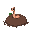 worm peeking from dirt