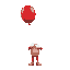 a red balloon floating with white gloves