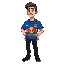 a man with short brown hair and light skin, a blue soccer t-shirt with a red bull logo in the center and some yellow stripes at the bottom of the jersey, black jeans, black shoes.