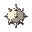 metallic spiked ball with one spike for each cardinal direction plus one facing forward
