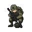 a soldier crouching disarming a bomb