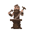 medieval blacksmith holding a hammer and a sword on anvil
