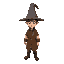 a boy in an old tunic wearing a wizard hat
