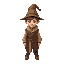 a boy in an old tunic wearing a wizard hat