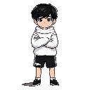 a boy with black hair and wearing a white high-necked sweatshirt with wide sleeves and also wearing black shorts with his arms crossed