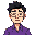 a man in his 30's, black hair, white glasses and a violet pique shirt, with videogame elements in the background