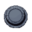 an open round sewer drain in an urban alley or roadside. the heavy round metal cover is pushed aside. looking from the side of the hole, not in it