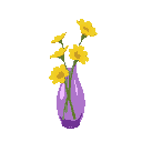 a transparent purple glass vase, and some yellow flowers.