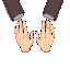 hands resting palms down as if it was on a invisible tableit should cut off after showing a little bit of their sleeves