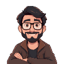 man with medium length dark hair short beard, glasses, cheesy smile, sitting in coffee shop with 