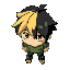 relaxed boy with side split black and blonde hair and a green shirt