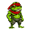 green toad-karatist with red bandage on head, turned right