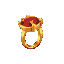 a golden ring with a red gem attached to it