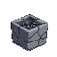 cube stone with small bits or coal inside